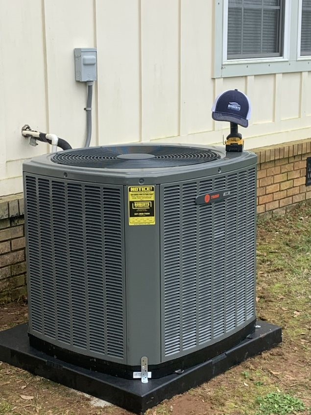 Air Conditioning system with Roberts AC branded hat