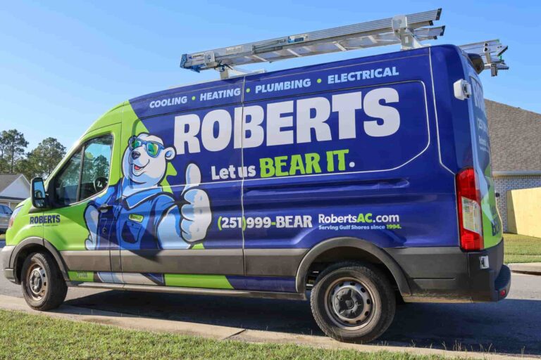 A Robert's AC Truck in front of a house after completing a furnace installation